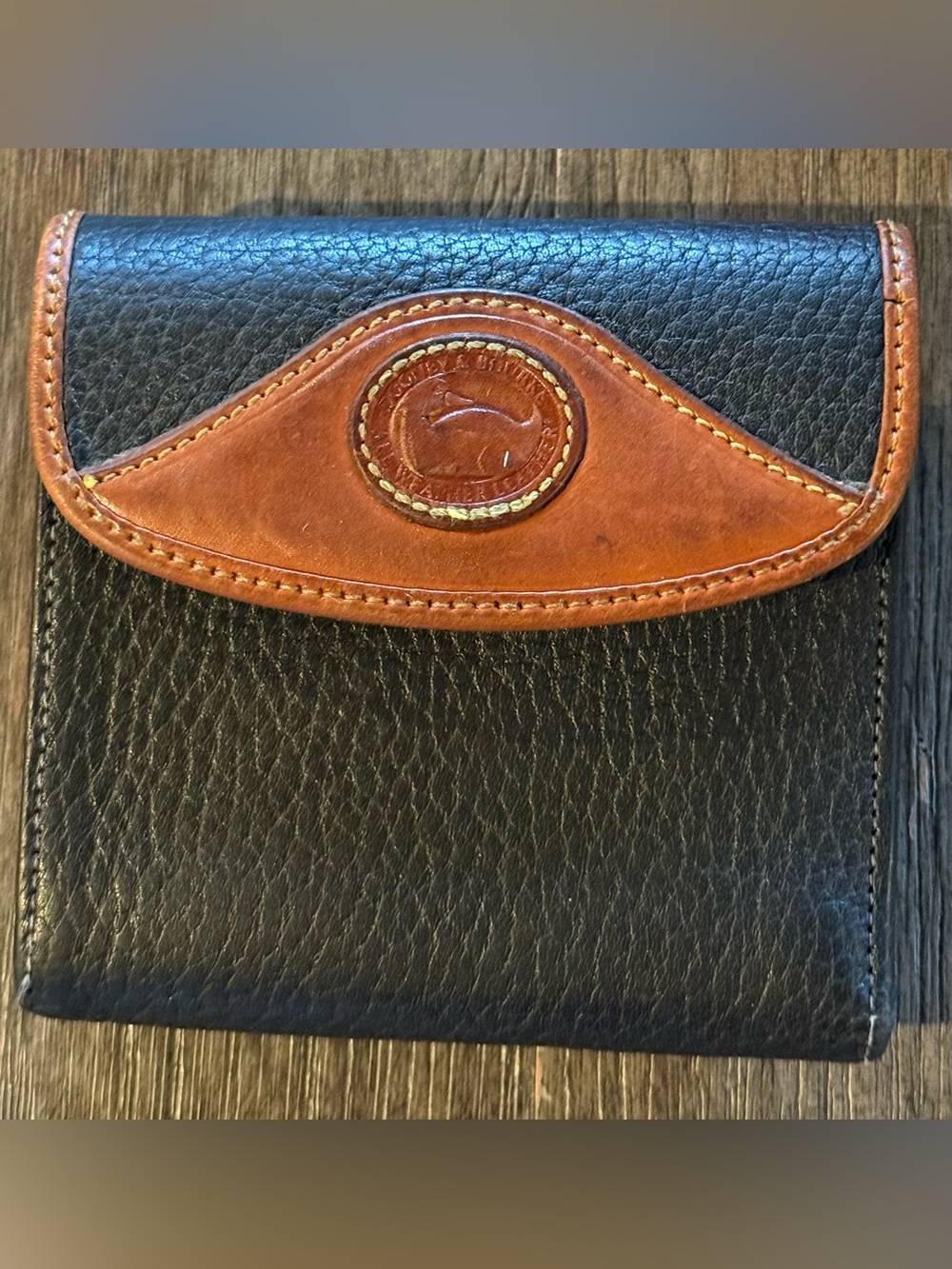 Dooney & Bourke Black Leather Wallet with Brown Trim